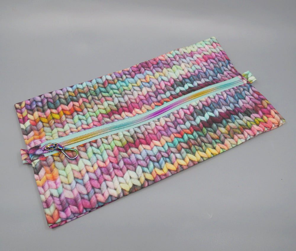 purple stockinette expandable zipper bag