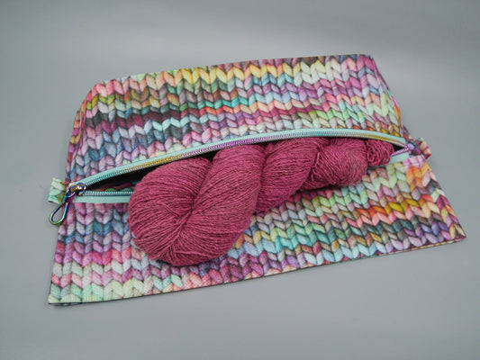 purple stockinette expandable zipper bag