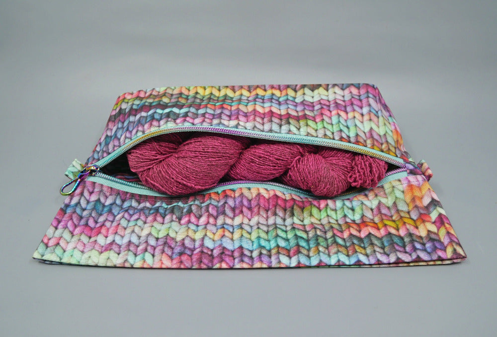 purple stockinette expandable zipper bag