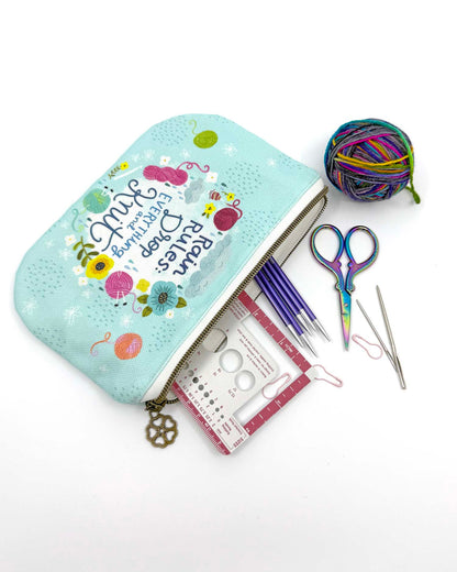 blue green canvas zippered pouch printed with yarn and flowers that says "rain rules drop everything and knit" 