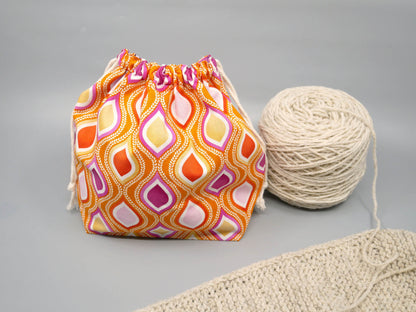 orange geometric drawstring project bag